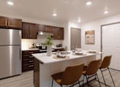 Thumbnail 8 of 34 - A modern kitchen with a dining table set for four.