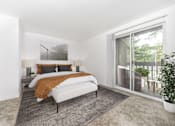 Thumbnail 10 of 29 - A bedroom with a large bed and a painting on the wall.