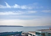 Thumbnail 5 of 22 - a view of the ocean from a building