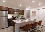 Thumbnail 2 of 24 - a kitchen with a large island with four chairs