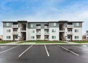 Thumbnail 6 of 18 - exterior view at the falls at rolland park apartments md
