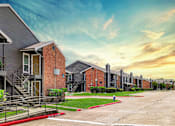 Thumbnail 27 of 27 - A row of modern houses with a red fire hydrant in the foreground.