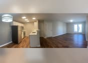 Thumbnail 31 of 35 - an open floor plan with a kitchen and living room