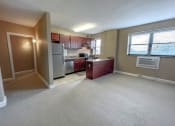 Thumbnail 28 of 43 - Living and kitchen at Convent Gardens Apartments, St. Louis