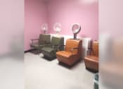 Thumbnail 10 of 15 - a group of chairs in a room with a pink wall