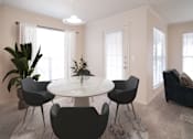 Thumbnail 17 of 33 - A modern dining room with a round table and chairs.