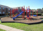 Thumbnail 4 of 26 - the playground at the apartments for rent