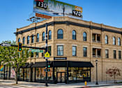Thumbnail 4 of 7 - A building with a sign that says 130 PLAYN 420 AUSTIN.