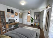 Thumbnail 3 of 12 - a bedroom with a bed and a desk and a closet