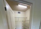 Thumbnail 9 of 15 - A white door with a handle is open.