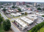 Thumbnail 16 of 31 - an aerial view of a city with buildings and cars at The Courts Midtown, Memphis, 38104