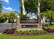 Thumbnail 11 of 26 - A sign that says Crestwood in front of a building.