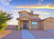 Thumbnail 2 of 3 - a house with a sunset in the background