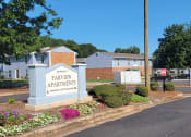 Thumbnail 1 of 3 - an exterior view of a property with a sign apartments