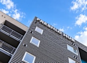 Thumbnail 24 of 43 - A building with the words Fresh Hub on it.