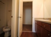 Thumbnail 4 of 13 - a bathroom with a toilet and a sink