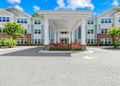 Thumbnail 4 of 10 - A large building with the number 251 on it.
