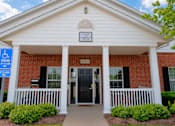 Thumbnail 12 of 19 - A building with a sign that says "Least Serious Community".