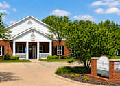 Thumbnail 8 of 19 - A church with a sign that says "Missionary Training Center".