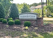 Thumbnail 7 of 7 - a sign for harpers glen in front of a garden