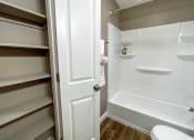 Thumbnail 4 of 38 - a small bathroom with a shower and a toilet