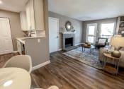 Thumbnail 1 of 38 - the view of the living room from the dining room and the kitchen with a fireplace