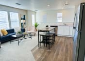 Thumbnail 5 of 65 - an open floor plan with a kitchen and living room