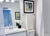 Thumbnail 49 of 65 - a small bathroom with a toilet and a sink