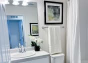 Thumbnail 54 of 65 - a small bathroom with a toilet and a sink