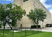 Thumbnail 10 of 10 - A large building with the words "Midland Medical Center" on the side.