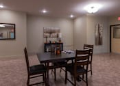 Thumbnail 12 of 17 - A conference room with a table and chairs.
