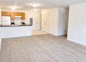 Thumbnail 19 of 20 - A kitchen with white appliances and a countertop.