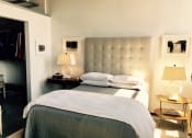 Thumbnail 20 of 34 - a bedroom with a bed and a closet