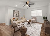 Thumbnail 4 of 14 - A living room with a couch, chairs, and a rug.at Mammoth at the Orchard Apartments, Rogers Arkansas  