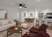 Thumbnail 1 of 14 - A living room with a couch, chairs, and a coffee table.at Mammoth at the Orchard Apartments, Rogers  