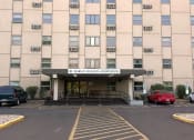Thumbnail 4 of 10 - the front of the marriott hills apartments building