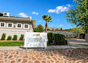 Thumbnail 8 of 9 - A sign for Mesa Pizza is displayed in front of a house.
