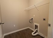 Thumbnail 14 of 18 - a room with a heater and a metal snake on the floor