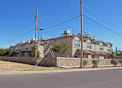 Thumbnail 8 of 8 - a row of houses on the side of a street