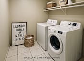 Thumbnail 3 of 47 - Laundry room with washers and dryers and a sign that says laundry today or naked tomorrow.