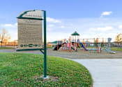 Thumbnail 9 of 32 - A sign in a park lists the rules for the park.