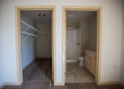 Thumbnail 19 of 25 - A room with a toilet and sink in it.