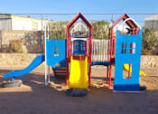 Thumbnail 11 of 11 - a playground with a swing set and slides