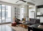 Thumbnail 8 of 24 - Living Room With Kitchen at Parcels at Concourse, Memphis