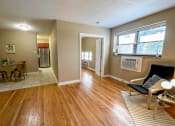 Thumbnail 18 of 43 - Living and open kitchen at Convent Gardens Apartments, Missouri, 63108