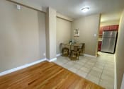 Thumbnail 11 of 43 - Living room and diningat Convent Gardens Apartments, St. Louis
