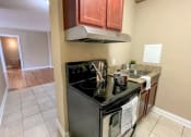 Thumbnail 12 of 43 - Dining and kitchen at Convent Gardens Apartments, St. Louis, MO, 63108