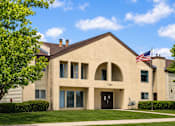 Thumbnail 2 of 5 - A building with the number 7334 on it.