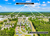 Thumbnail 11 of 11 - An aerial view of a residential area with a label indicating it is the Renaissance Commons 301 in Elizabeth City.