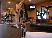 Thumbnail 26 of 26 - a bottle of energy drink sitting on a counter in a gym